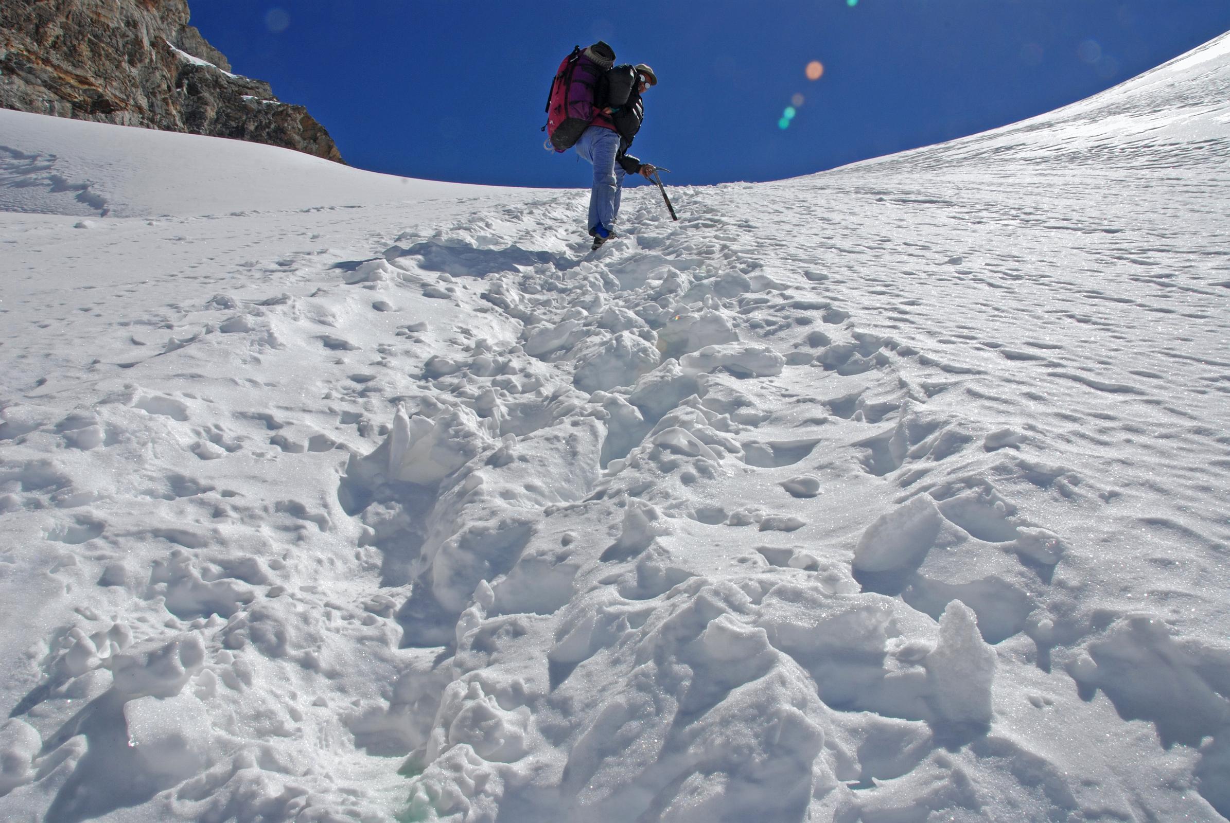 Rolwaling 07 10 Climbing Sherpa Palden Cutting Steps On Steep Snow On Climb To Tashi Lapcha Pass